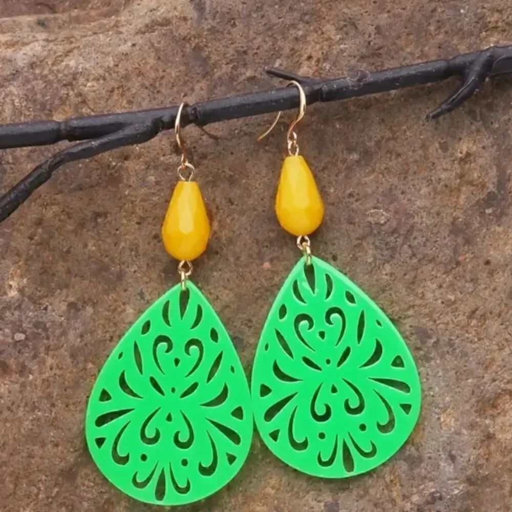 Green boho style dangle earrings